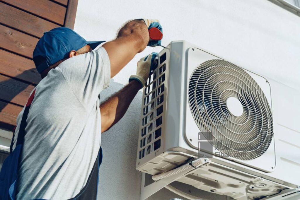 repairman uniform installing outside unit air conditioner 1 1024x683 1