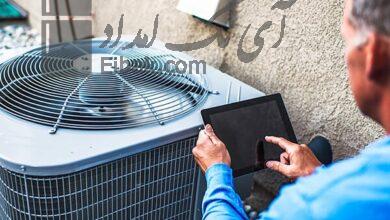 technician troubleshooting air conditioner