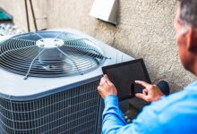 technician troubleshooting air conditioner 3